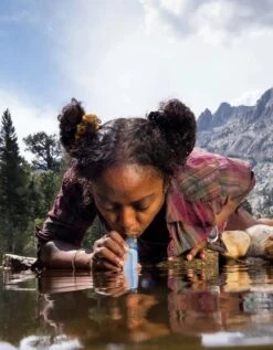 LifeStraw Peak Series Personal Straw Water Filter -Outdoor Research Store LifeStraw PEAK Personal Mountain Blue Lifestyle Drinking Woman Adam Barker 02 1000x 9dd89ad1 7516 411d bd59 8c585e80da8d