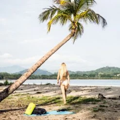 ORTLIEB Ultralight PS10 Dry Bag -Outdoor Research Store ORTLIEB Ultralight PS10 Dry Bag Roll Lifestyle Beach 3