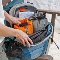 ORTLIEB Ultralight PS10 Dry Bag -Outdoor Research Store ORTLIEB Ultralight PS10 Dry Bag Roll Lifestyle Packed Inside Backpack